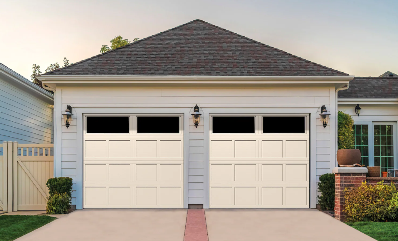 Repair technician fixing a residential garage door in Delaware, highlighting local garage door services